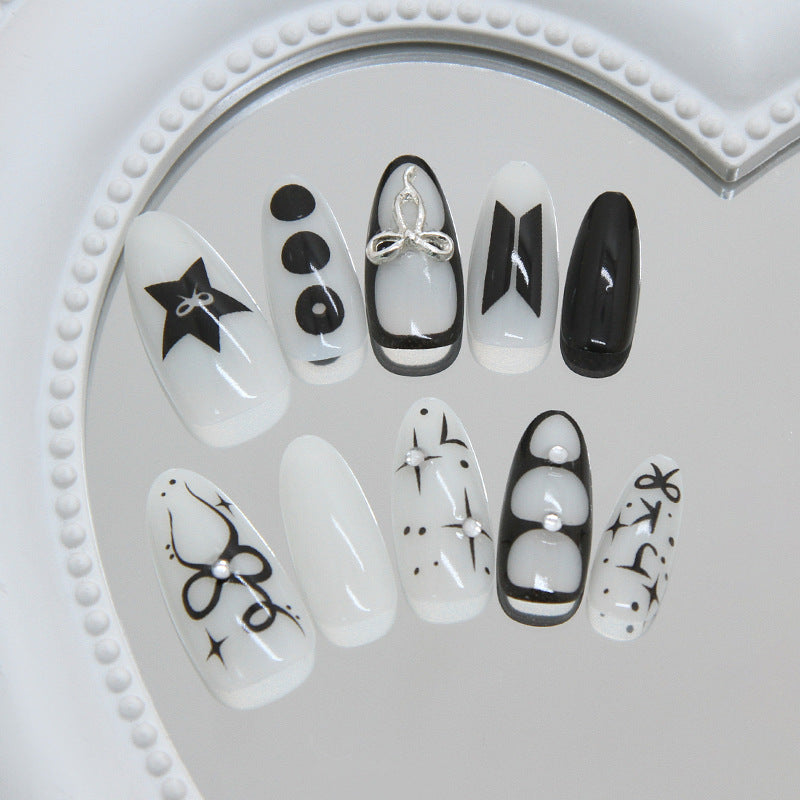 Chic Monochrome Medium Almond White and Black Nail Set with Elegant Designs