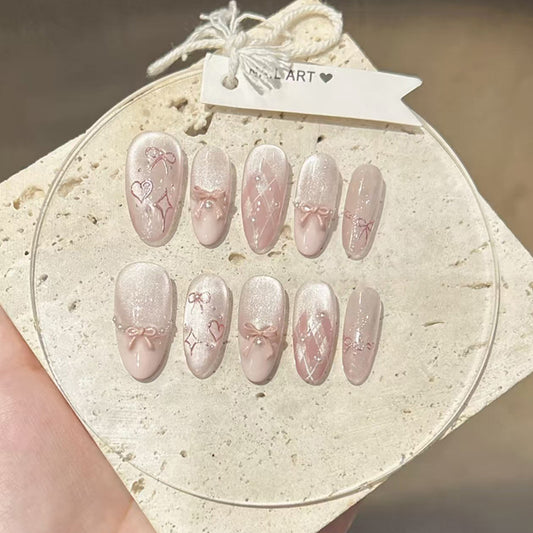 Romantic Blush Medium Almond Pink Glitter Nail Set with Bow Accents