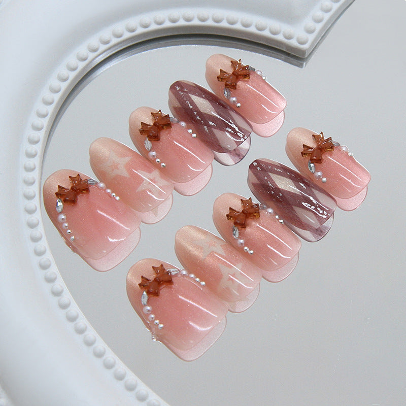 Celestial Charm Medium Oval Blush Pink Press on Nail Set with Star and Pearl Accents