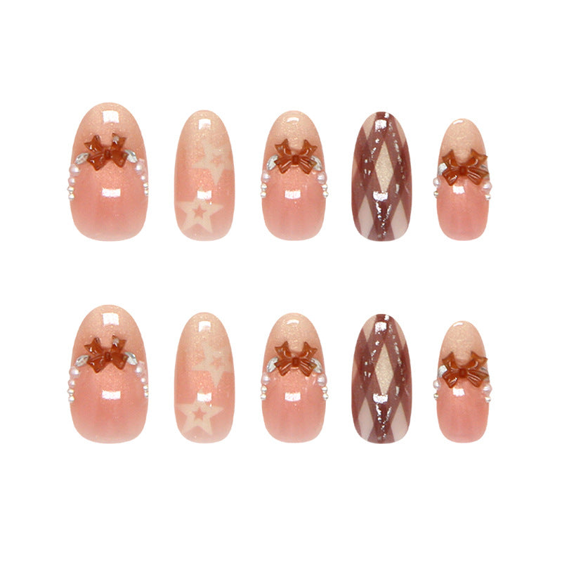 Charming Starry Bow Medium Round Blush Nails with Elegant Gems