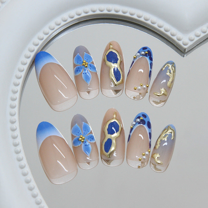 Serene Blue Floral Medium Almond Nail Set with Elegant Gold Accents