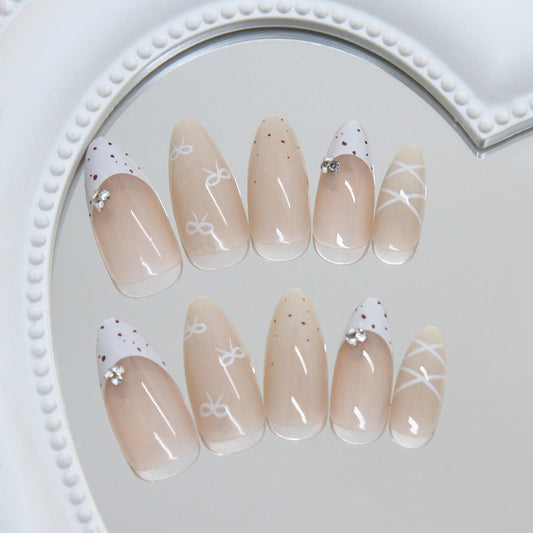 Elegant Romance Medium Almond Beige with Delicate White Designs and Sparkling Accents Press On Nail Set