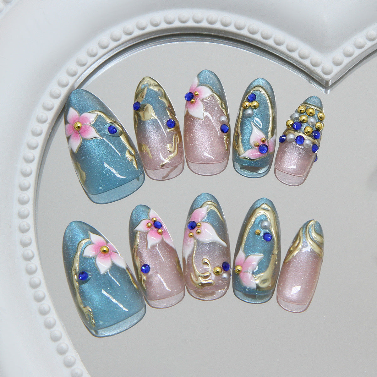 Enchanting Floral Medium Almond Blue and Pink Nail Set with Glitter Accents