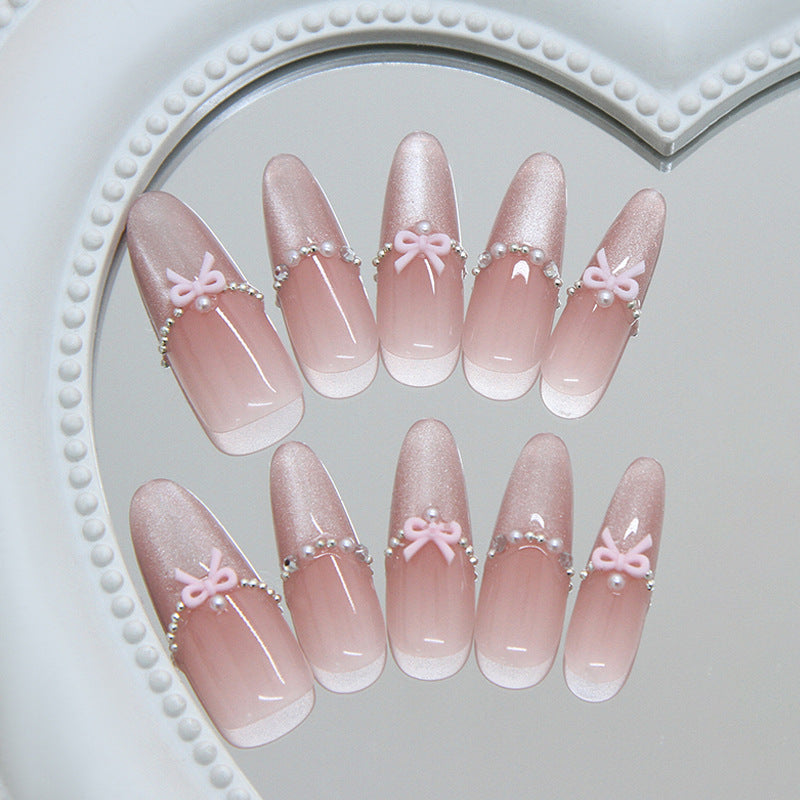 Lovely Charm Long Almond Pink Ombre Nails with Bow and Pearl Accents
