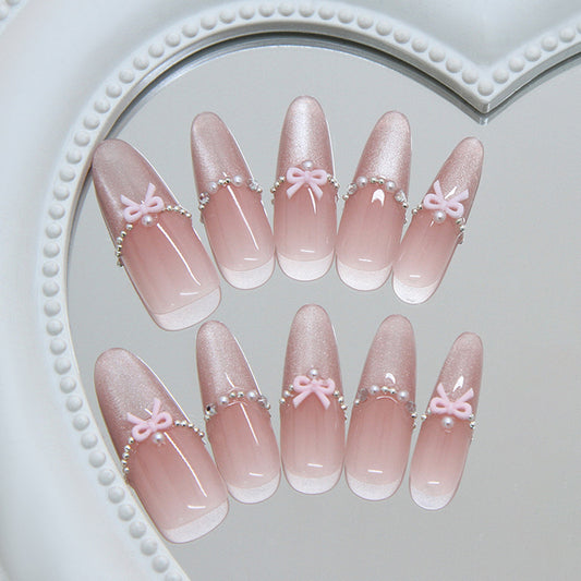 Lovely Charm Long Almond Pink Ombre Nails with Bow and Pearl Accents