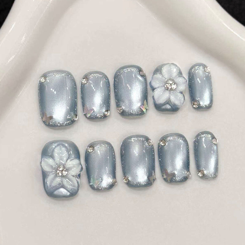 Enchanting Sky Blue Short Square Nails with Floral Accents
