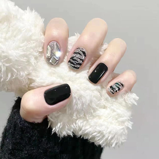 Midnight Sparkle Medium Round Black Press On Nails with Glitter Accents and Holographic Detailing