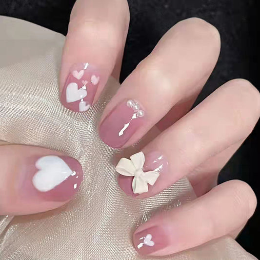 Romantic Affair Short Round Lavender Press On Nails with White Heart Accents and 3D Bow Embellishments