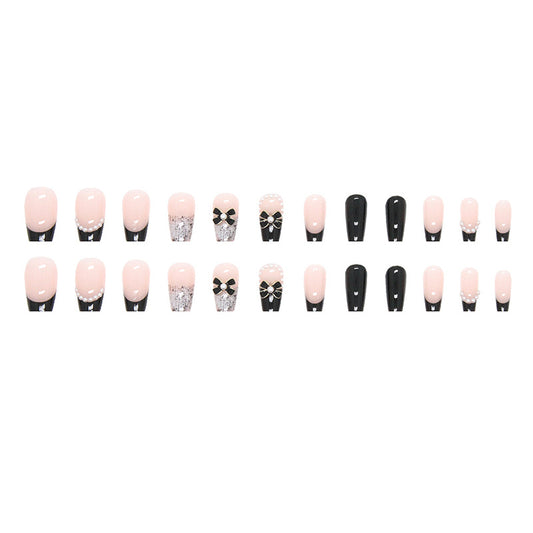Set of nail art designs with pink, black, and decorative elements on a white background