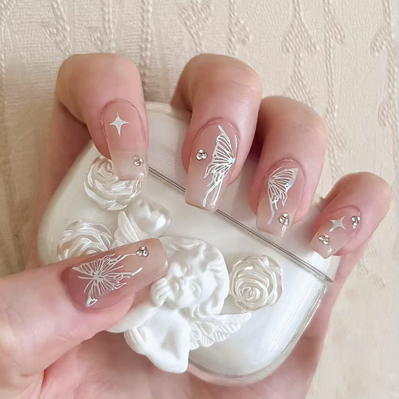 Ethereal Elegance Long Coffin Beige Nails with Celestial Butterfly Design and Shimmering Accents