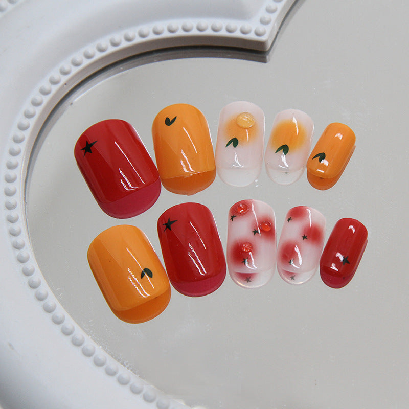 Citrus Sunrise Short Square Red Orange Yellow Nail Set with Playful Floral Design