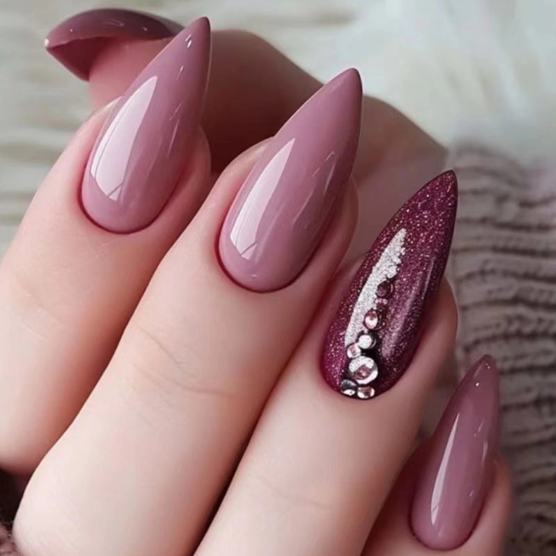 Chic Elegance Long Stiletto Soft Pink Nails with Glittering Accent Feature