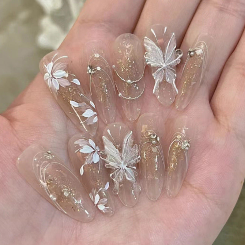 Enchanted Garden Long Almond Clear Press On Nail Set with White Floral Accents and Glitter Embellishment