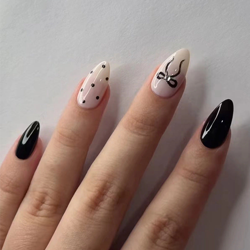 Chic Elegance Medium Almond Black and Beige Press On Nail Set with Dotted and Bow Accent Design