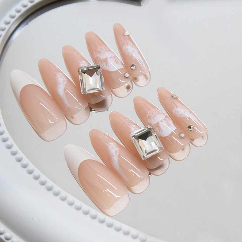 Chic Elegance Long Almond Blush Pink Press On Nail Set with Gemstone Accents and Artistic Design