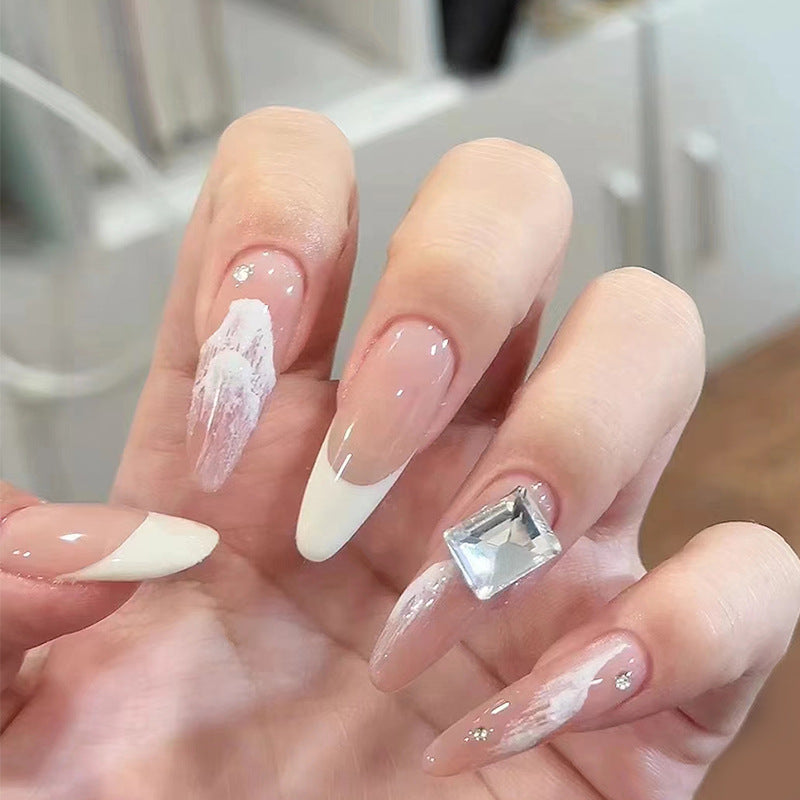 Elegant Winter Wonderland Long Stiletto Press On Nail Set in Soft Pink and White with Dazzling Rhinestone Accent