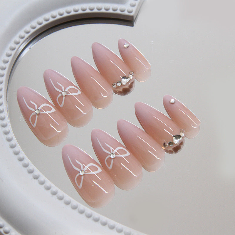 Chic Elegance Long Almond Pink Press On Nail Set with Rhinestone and Bow Accents