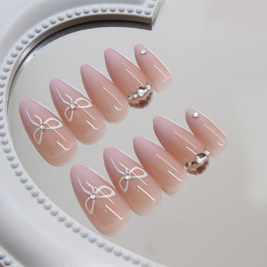 Chic Elegance Long Almond Pink Press On Nail Set with Rhinestone and Bow Accents