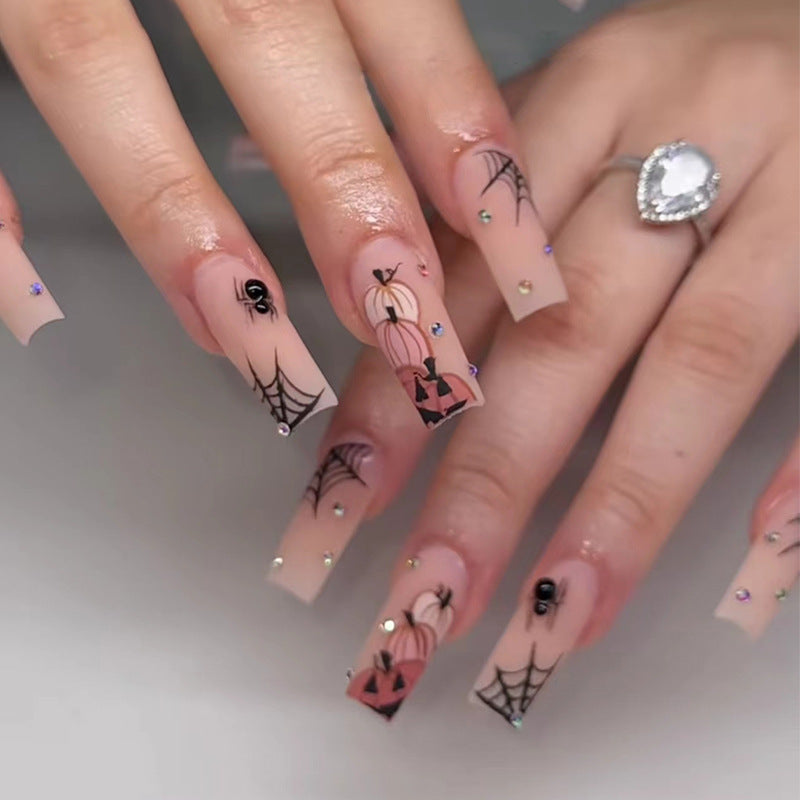 Spooky Harvest Long Square Beige Nails with Pumpkin and Spider Designs and Sparkling Accents