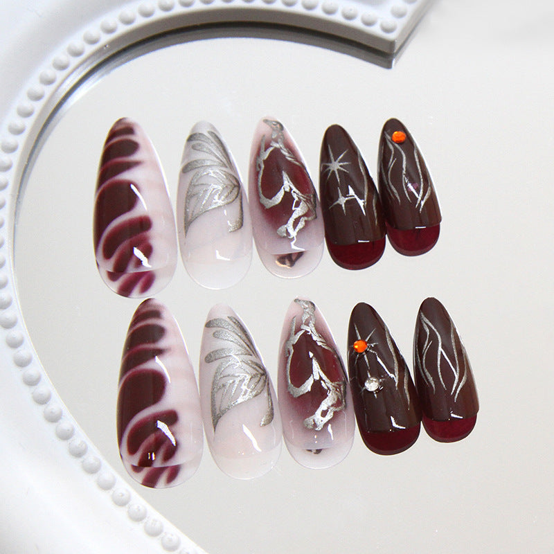 Elegant Autumn Dream Medium Almond Shaped Burgundy and Brown Press On Nail Set with Unique Silver Detailing and Eye-Catching Accents