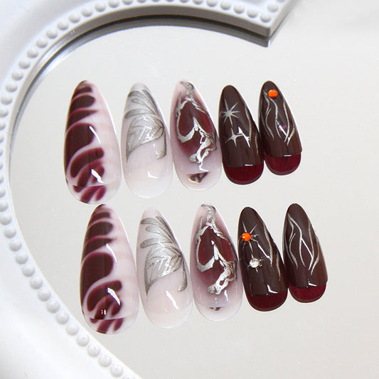 Elegant Autumn Dream Medium Almond Shaped Burgundy and Brown Press On Nail Set with Unique Silver Detailing and Eye-Catching Accents