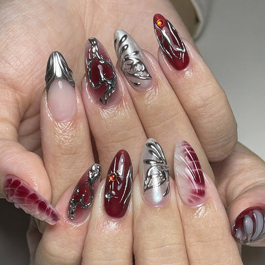 Gothic Elegance Long Almond Burgundy and Silver Nail Set with Intricate Designs
