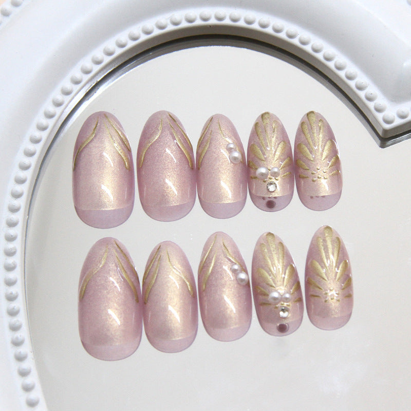 Elegant Blossom Press-On Nail Set Medium Almond Shaped Soft Pink with Gold Accents and Pearlescent Details