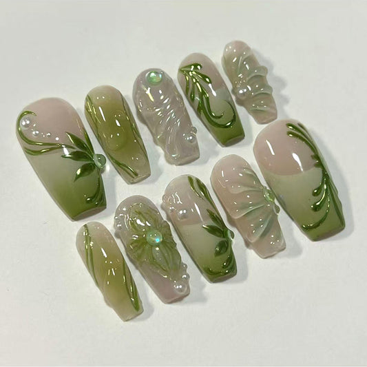 Botanical Elegance Medium Coffin Green Ombre Press On Nail Set with Opalescent Accents and Floral Designs