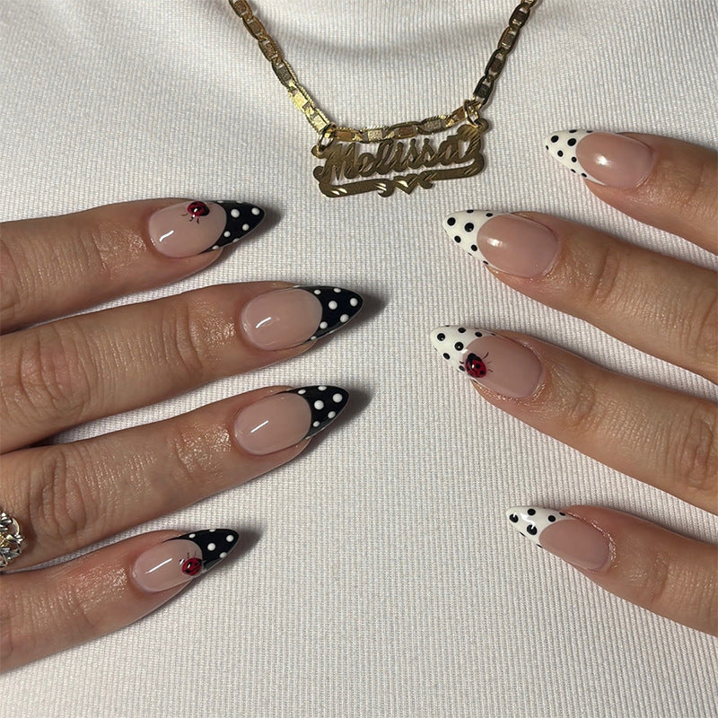 Vintage Charm Medium Almond Black and White Polka Dot Press On Nail Set with Floral Accent
