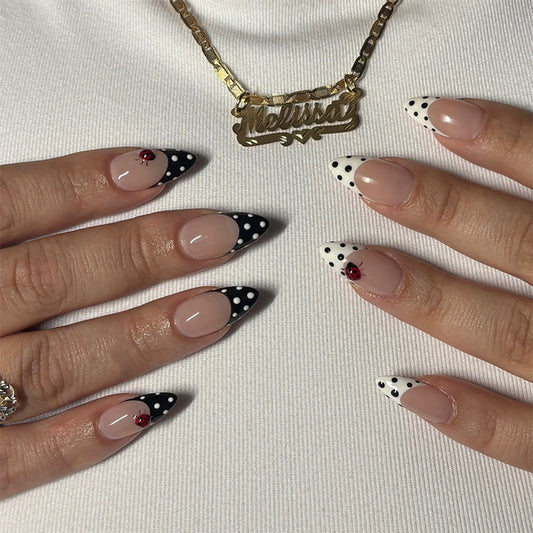 Vintage Charm Medium Almond Black and White Polka Dot Press On Nail Set with Floral Accent