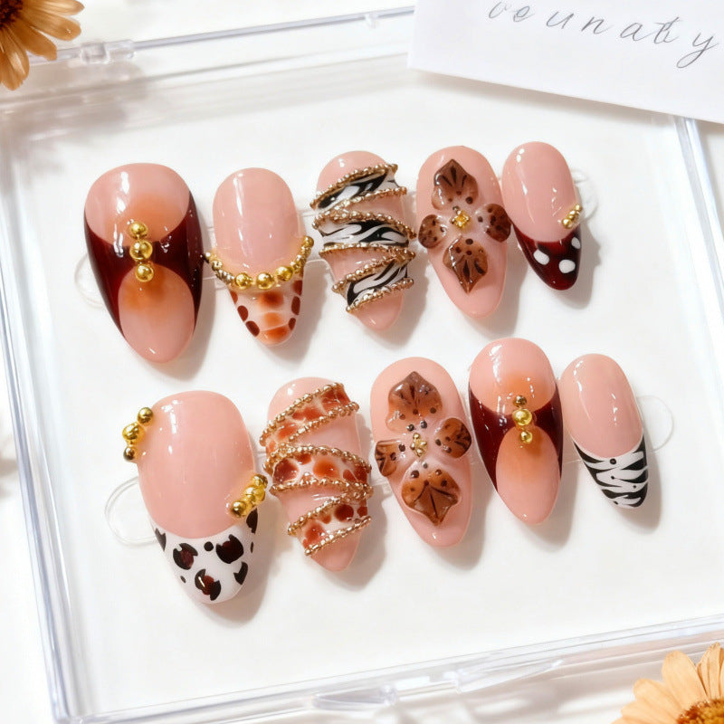 Chic Bohemian Medium Almond Blush Pink Press-On Nail Set with Gold Accents and Intricate Floral Design