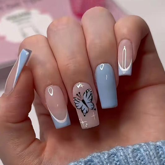 Butterfly Kisses Long Coffin Light Blue Press On Nails with Elegant White Accents and Artistic Paperclip Designs