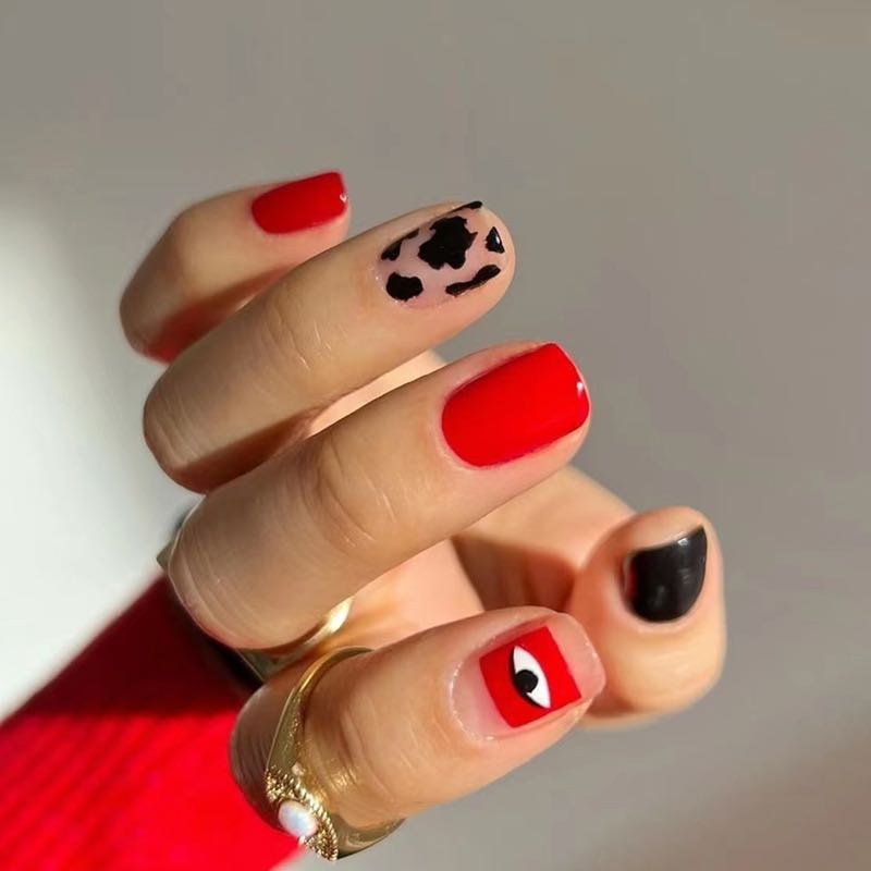 Eyeing You Cow Spot Short Squoval Red Animal Pattern Nails