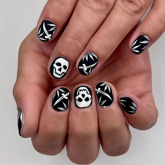 Gothic Glamour Short Round Black Press On Nail Set with White Skeleton and Leaf Patterns