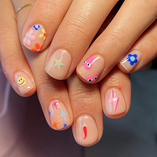 Whimsical Wonderland Medium Length Squoval Press On Nail Set in Pastel Colors with Playful Emoji and Pattern Accents