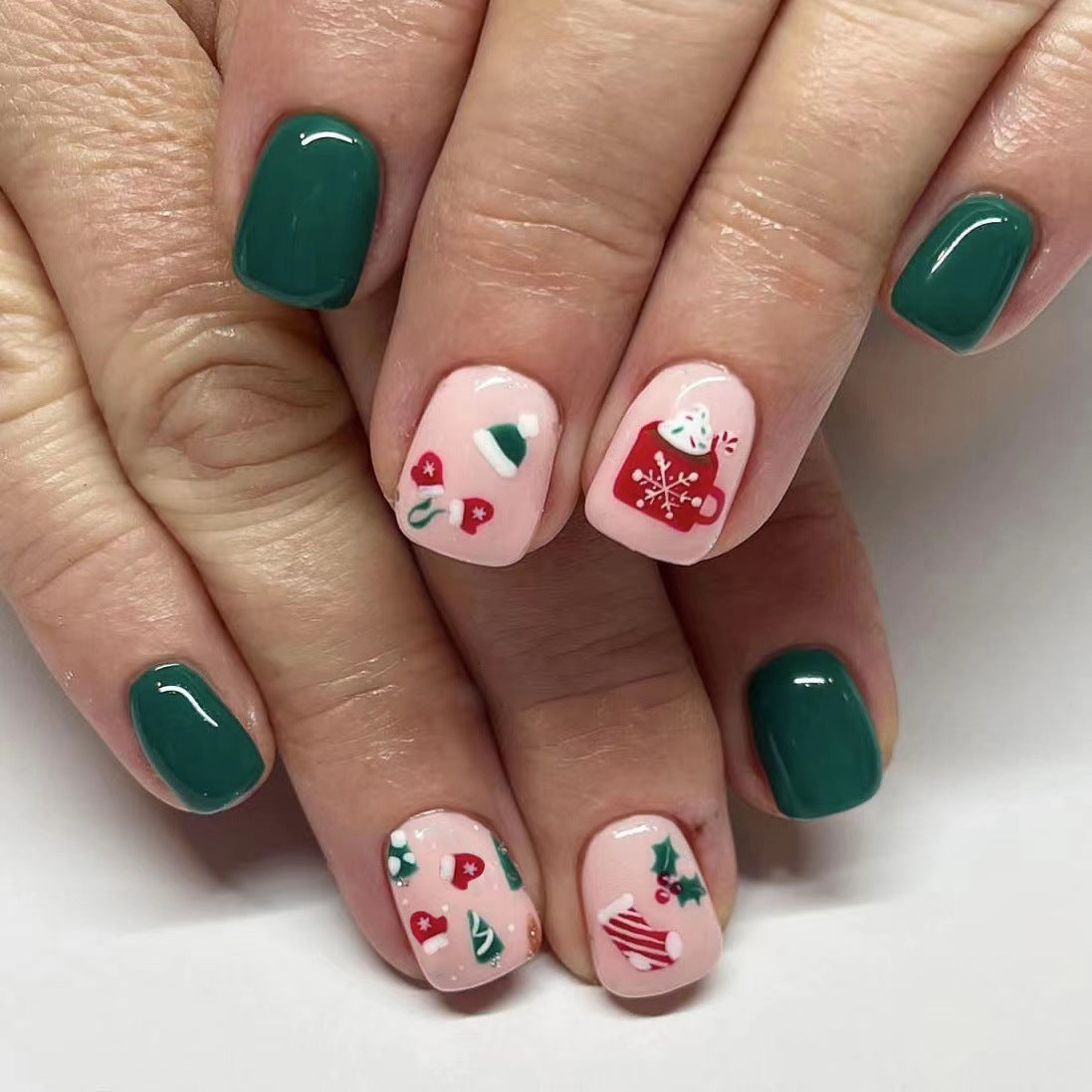 Holiday Charm Short Square Pink and Green Press On Nail Set with Festive Snowman and Candy Cane Design