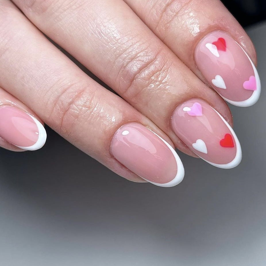 Lovely Hearts Short Oval Pink Press On Nail Set with White French Tips and Heart Accents