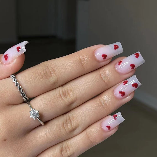 Valentine's Day Elegance Medium Square Clear Press On Nails with Red Heart Accents and Glossy Finish