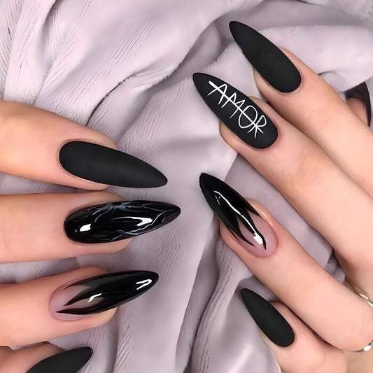 Black nail polish with a brand name on a white fabric background