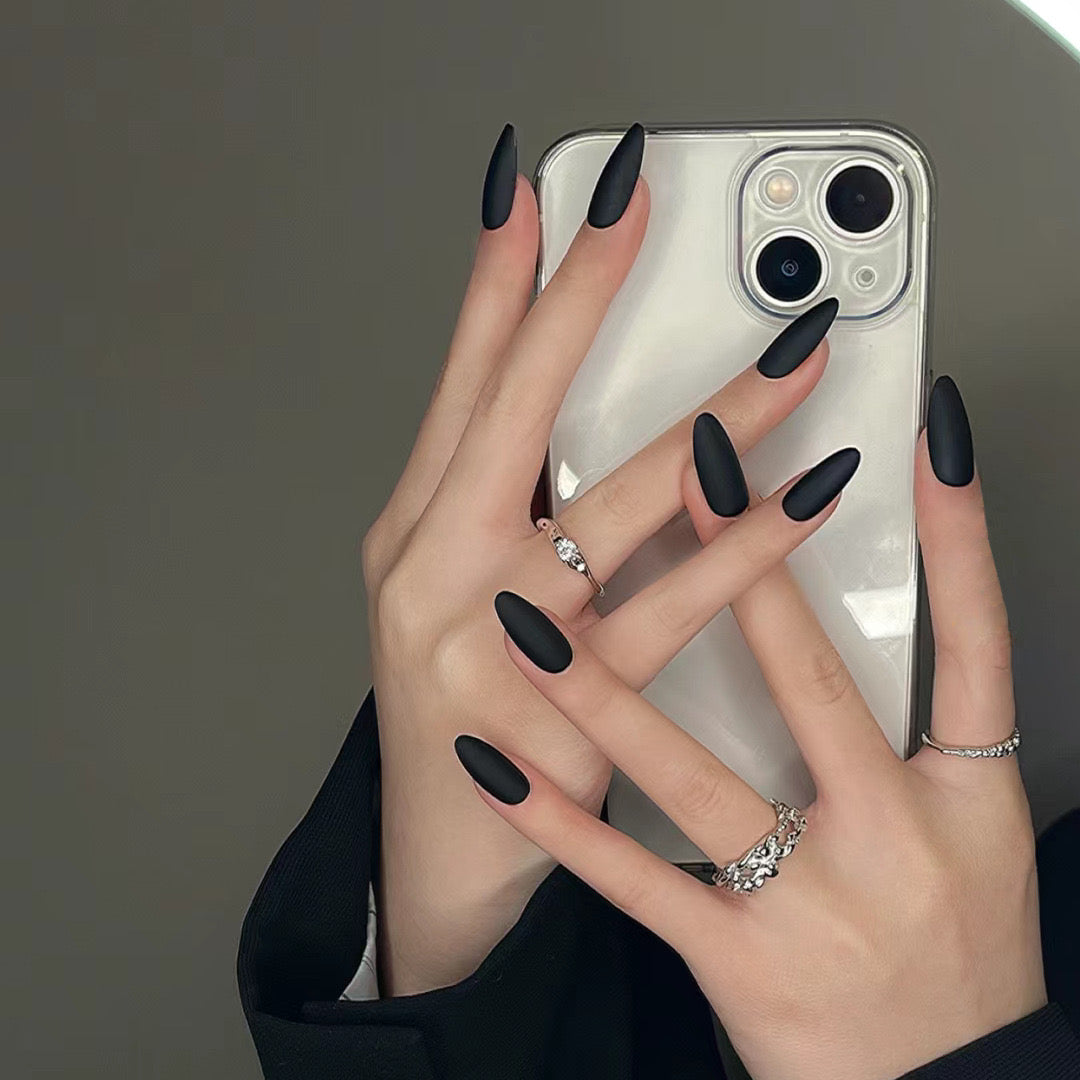 Sleek Midnight Matte Medium Almond Press-On Nails Set with Elegant Simplicity