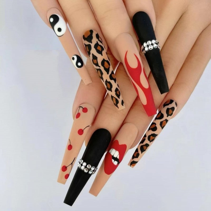 Fierce Fashion Fiesta Long Coffin Black and Leopard Print Press On Nail Set with Eye-Catching Rhinestone Accents and Unique Lip Artwork