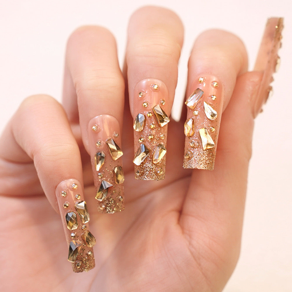 Glamorous Long Coffin Beige Press-On Nails with Gold Glitter Gradient and Luxe Gem Accents