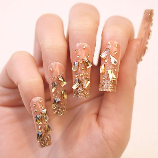 Glamorous Long Coffin Beige Press-On Nails with Gold Glitter Gradient and Luxe Gem Accents