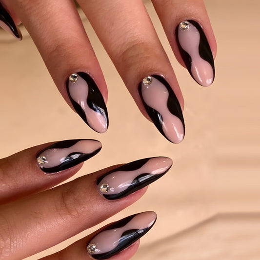 Galaxy Glamour Long Almond Press-On Nails with Black and Beige Swirl Design and Crystal Accents