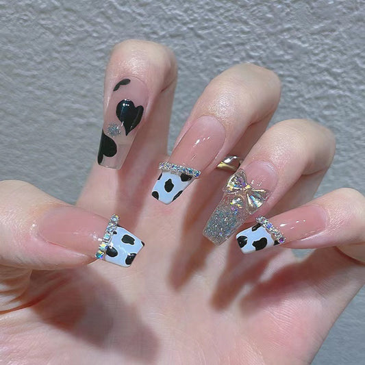 Glitz & Glamour Long Coffin Black and White Cow Print Press On Nail Set with Sparkling Rhinestones and Glitter Accents