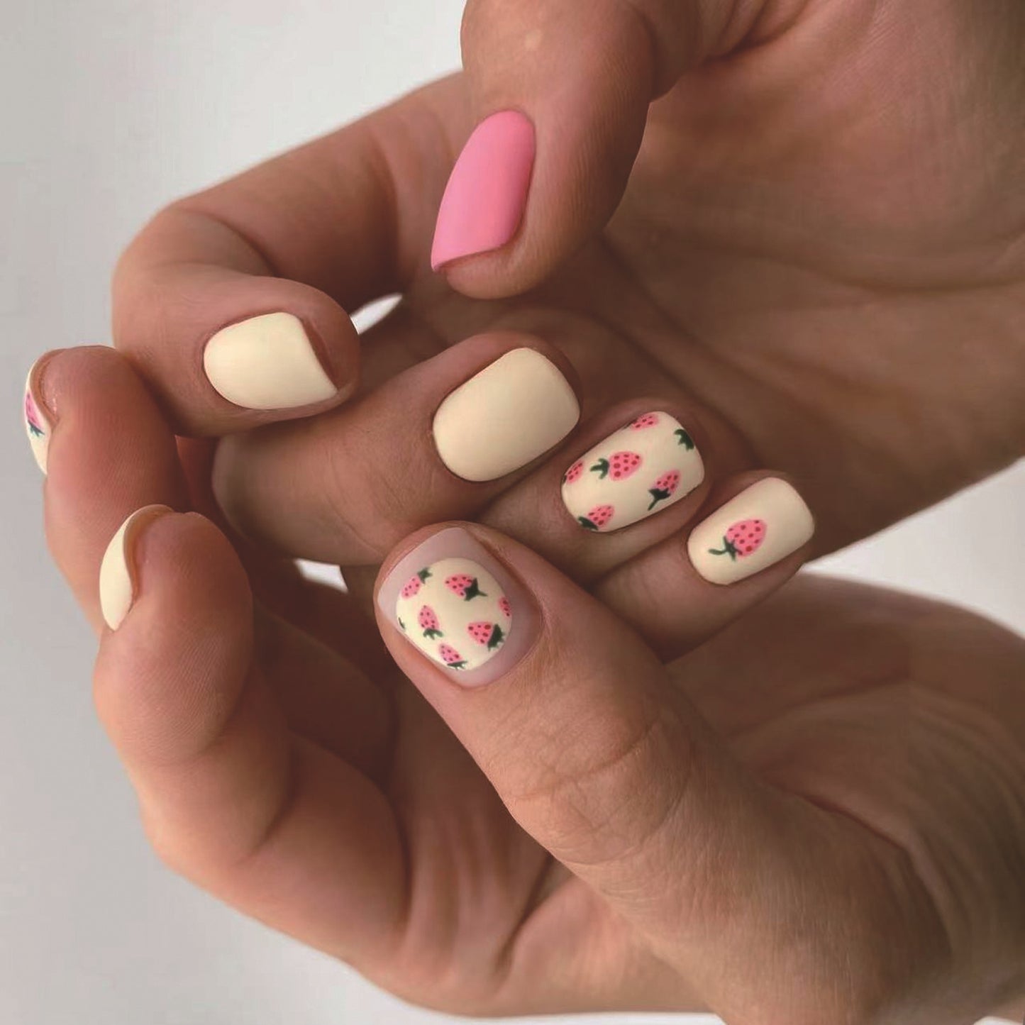 Summer Picnic Short-Length Squoval Pastel Pink and Cream Press On Nail Set with Strawberry Accent Designs