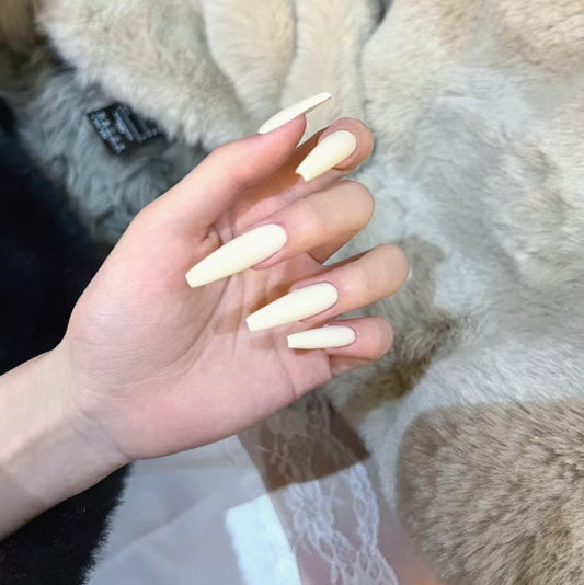 Sophisticated Ivory Long Coffin Matte Cream Press-On Nails with a Smooth Finish