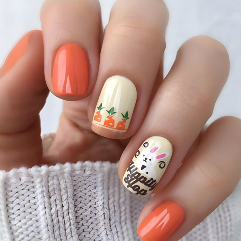 Hop into Spring Medium Squoval Peach and Cream Press-On Nails with Carrot and Bunny Accents