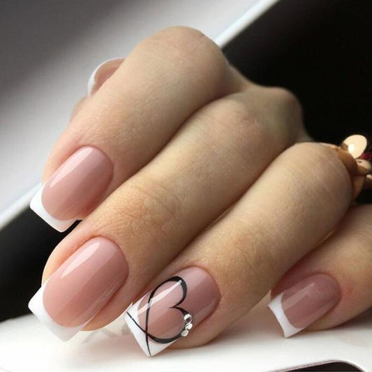 A pair of medium-sized square white French tips press-on nails.