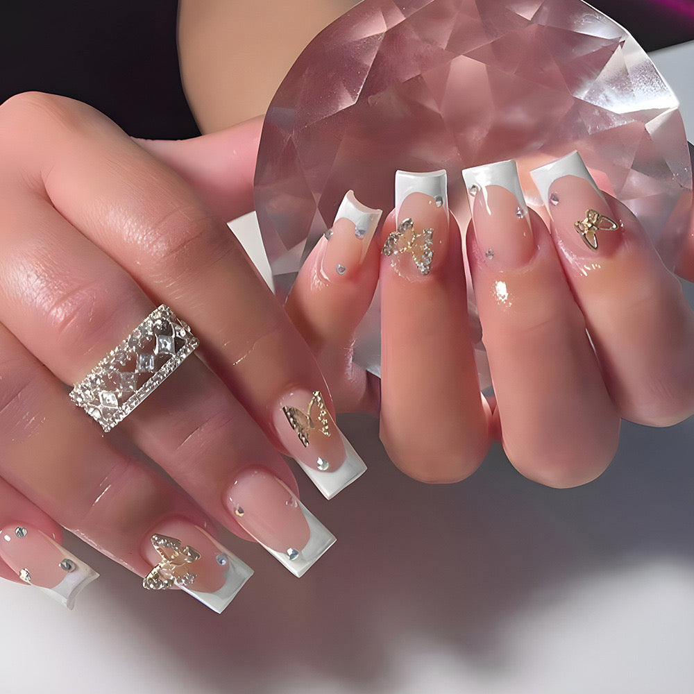 Glamorous Gala Long Square French Tip Press On Nails with Gold Flakes and Bejeweled Butterflies